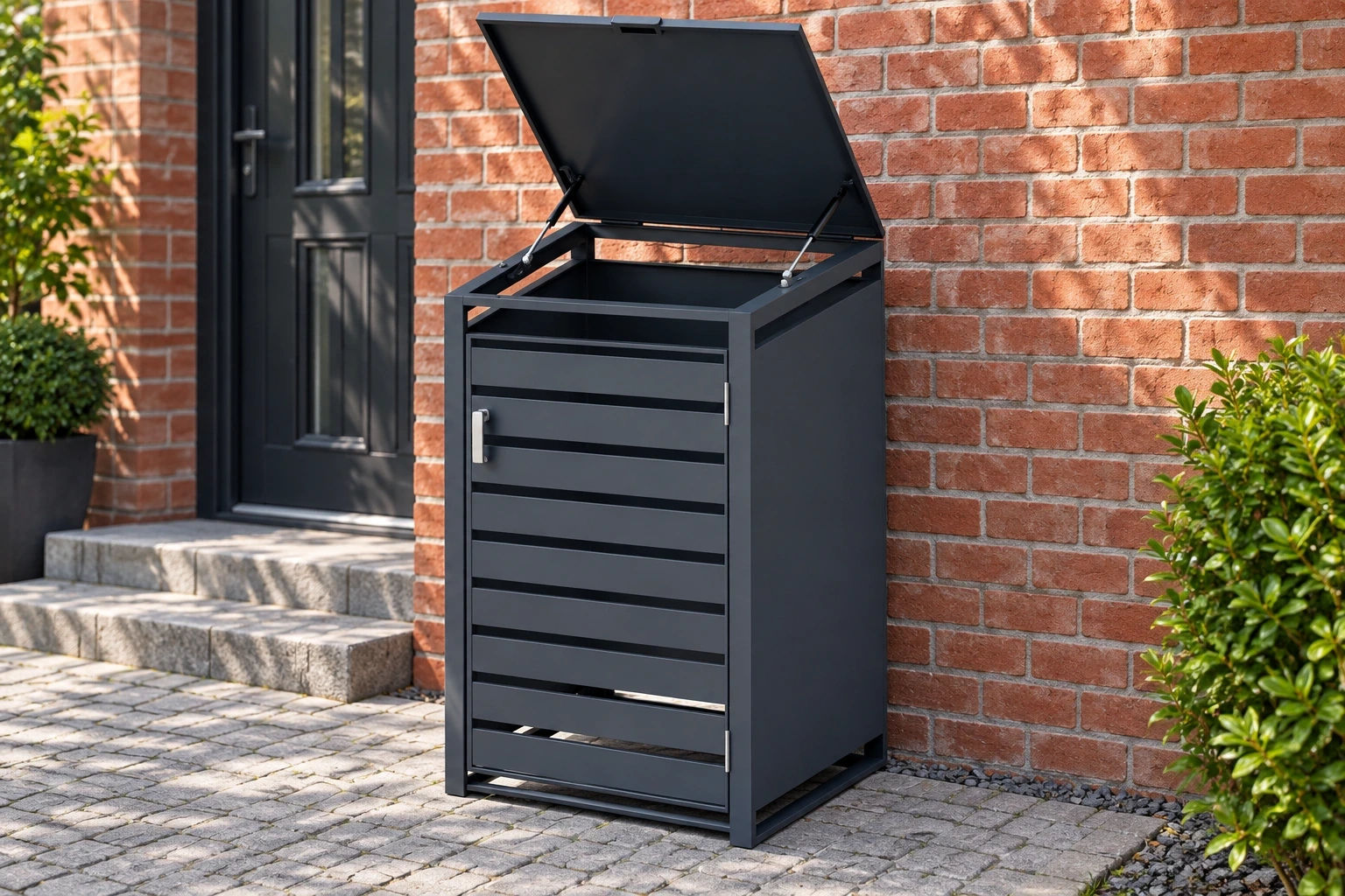 Charcoal single-bin enclosure with horizontal front slats beside a brick service entrance.