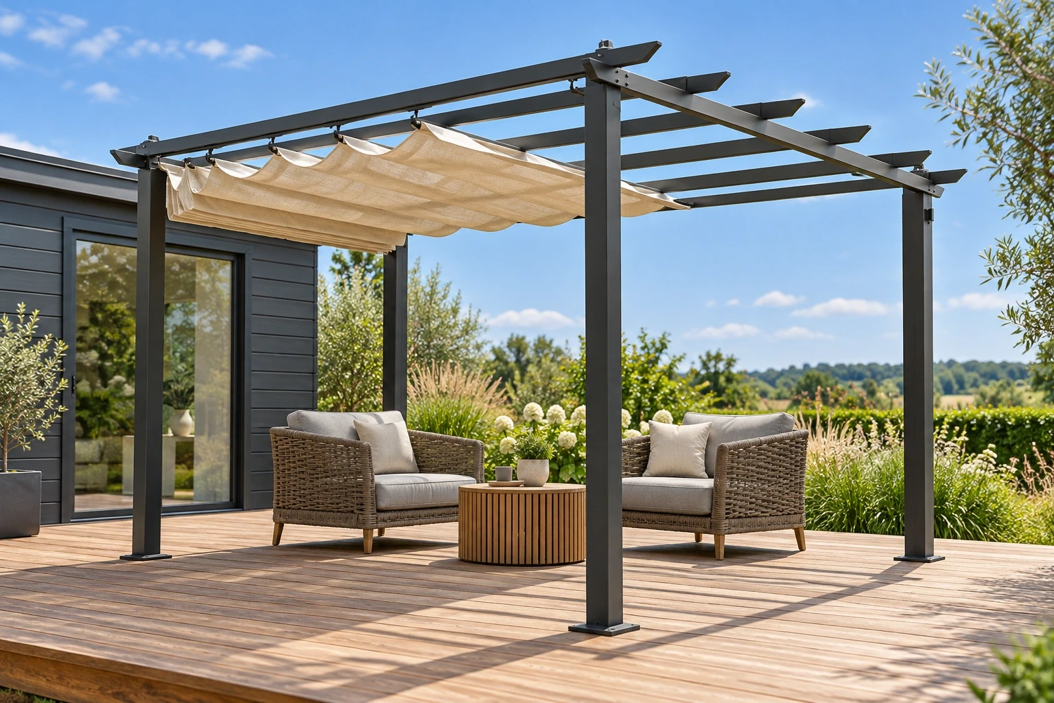 Cream fabric canopy partly gathered beneath graphite projecting rafters over two armchairs on a timber garden deck.