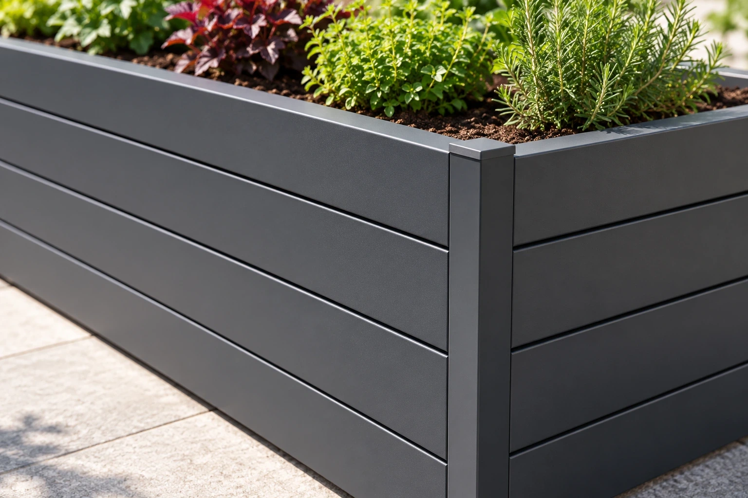 Close view of stacked aluminium planter profiles meeting a capped vertical corner support